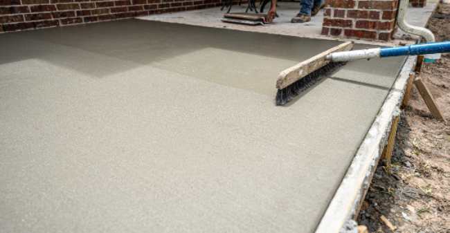 Plain broom-finished concrete driveway