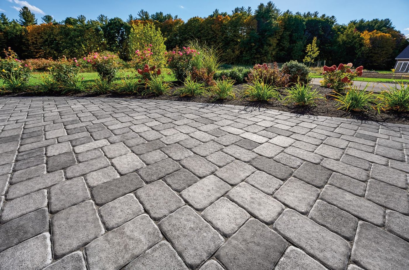 Cobblestone paver driveway and walkway by gate