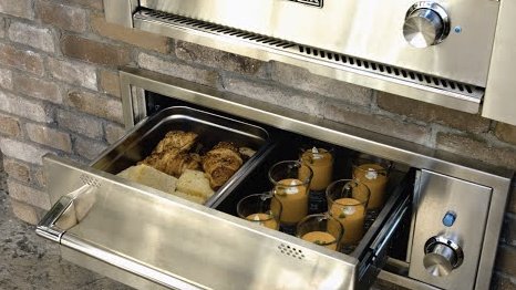 Warming ovens for outdoor kitchens